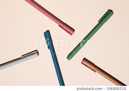 Multicolored pens layout. Stationery collection. 106808318