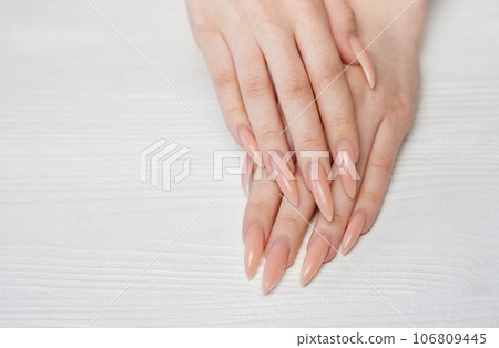 Elegant pastel pink natural manicure. 106809445