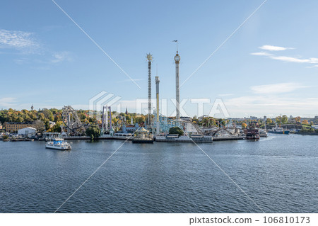 View of amusement park Grona Lund with carousels and tour rides on Djurgarden island Stockholm Sweden View of amusement park Grona Lund with carousels and tour rides on Djurgarden island Stockholm Sweden 106810173