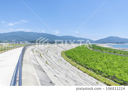 Rikuzentakata City, Iwate Prefecture: A huge seawall built as a tsunami countermeasure and Takada Matsubara planted with trees for regeneration 106811224