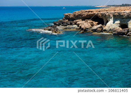 Sea caves near Ayia Napa, Mediterranean sea coast, Cyprus Sea caves near Ayia Napa, Mediterranean sea coast, Cyprus 106811405