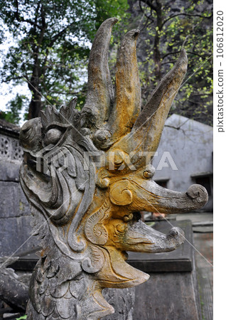 Antique carving in stone with mythical motif. Bich Dong pagoda, Vietnam 106812020