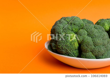 broccoli of fresh green broccoli in bowl over coloredbackground. , close up. Fresh vegetable 106814069