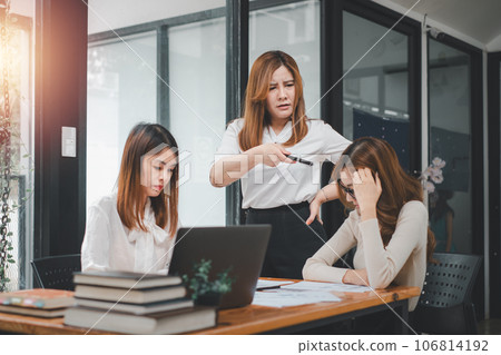 Serious business team leader coach mentor talk to diverse business people in office explain strategy at corporate group meeting, multiethnic staff listen to boss instruct interns at briefing 106814192