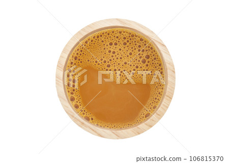 Drink relax concept, Hot milk tea in a wooden cup on isolated 106815370