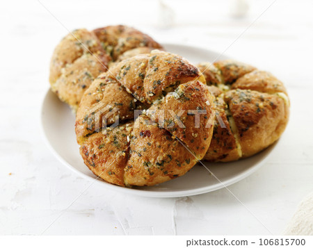 Homemade garlic bread with butter and garlic. Homemade garlic bread with butter and garlic. 106815700