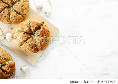 Homemade garlic bread with butter and garlic. Homemade garlic bread with butter and garlic. 106815702
