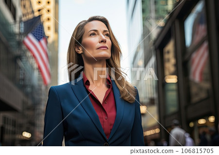 Close-up of a blonde Scandinavian businesswoman in a formal suit against the backdrop of skyscrapers in the business district of the city. Close-up of a blonde Scandinavian businesswoman in a formal suit against the backdrop of skyscrapers in the business district of the city. 106815705