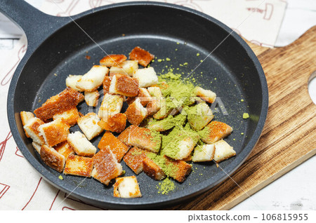 Bread ears rusk sprinkled with matcha powder Bread ears rusk sprinkled with matcha powder 106815955