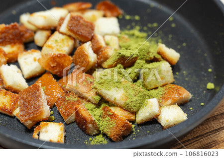 Bread ears rusk sprinkled with matcha powder Bread ears rusk sprinkled with matcha powder 106816023