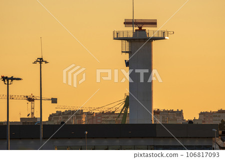 ATC tower of an airport on summer evening in silhouette ATC tower of an airport on summer evening in silhouette 106817093