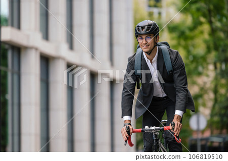 Young manager comuting to the office by electic scooter 106819510