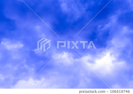 An unrealistically blue cloudy sky. Mystery, spirituality, universe. Background, abstract An unrealistically blue cloudy sky. Mystery, spirituality, universe. Background, abstract 106819746