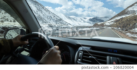 Driving car on the high altitude road, China 106820004