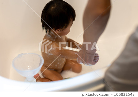 Child taking a bath Infant 106821542