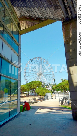 The Ferris wheel in the public gardens of Olbia in Sardinia, Italy. 106824565