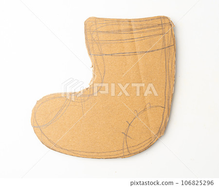 Cardboard Christmas Sock, Socks Made of Carton Piece, Ripped Kraft Paper, Brown Wrapping Vintage Paper 106825296