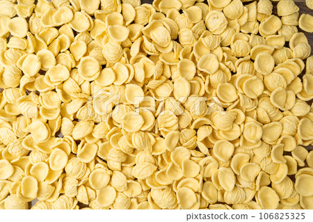 Raw Orecchiette Pasta, Homemade Dry Macaroni, Italian Recchietedde Raw Orecchiette Pasta, Homemade Dry Macaroni, Italian Recchietedde 106825325