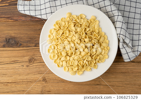 Raw Orecchiette Pasta, Homemade Dry Macaroni, Italian Recchietedde Raw Orecchiette Pasta, Homemade Dry Macaroni, Italian Recchietedde 106825329