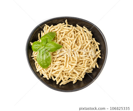Raw Trofie Pasta, Dry Italian Macaroni, Traditional Genoa Food, Raw Noodle, Modern Ligurian Cuisine Raw Trofie Pasta, Dry Italian Macaroni, Traditional Genoa Food, Raw Noodle, Modern Ligurian Cuisine 106825335