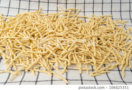 Raw Trofie Pasta, Dry Italian Macaroni, Traditional Genoa Food, Raw Noodle, Modern Ligurian Cuisine 106825351
