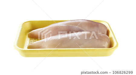 Two pieces of raw chicken fillet in a yellow plastic container. Meat of poultry in tray, isolated on white background. Two pieces of raw chicken fillet in a yellow plastic container. Meat of poultry in tray, isolated on white background. 106826299