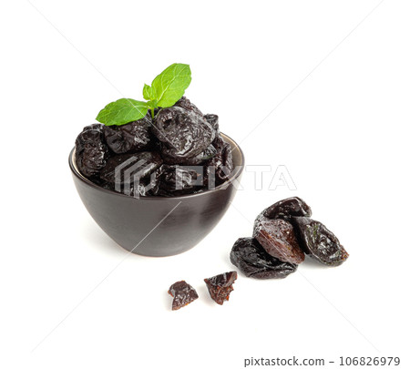 Dry Plums Isolated, Dried Black Fruits, Prune Group, Dry Plum Fruit on White Background Dry Plums Isolated, Dried Black Fruits, Prune Group, Dry Plum Fruit on White Background 106826979