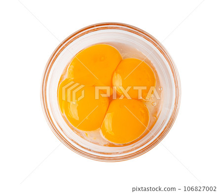 Egg Yolks in Bowl, Fresh Chicken Egg Yolk Separated from Whites for Cooking Recipe, Organic Yolks Top View 106827002
