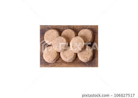 Raw falafel, a traditional oriental dish with spices and herbs Raw falafel, a traditional oriental dish with spices and herbs 106827517