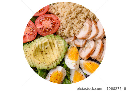 Delicious healthy lunch consisting of chicken, avocado, quinoa, eggs and tomatoes Delicious healthy lunch consisting of chicken, avocado, quinoa, eggs and tomatoes 106827546