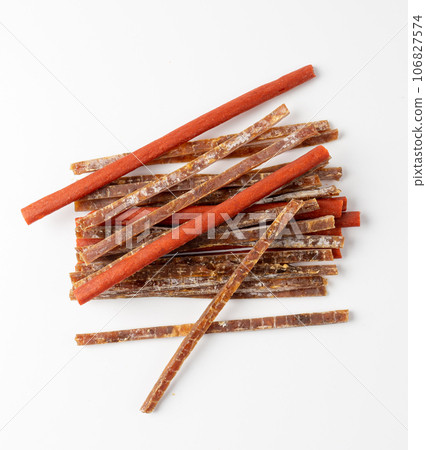 Meat Jerky Isolated, Dry Salted Chicken Slices, Small Pieces of Dehydrated Beef, Beer Snacks, Dried Pork 106827574