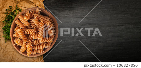 Raw Brown Pasta, Wholegrain Fusilli, Dry Whole Grain Noodle, Raw Spelt Macaroni, Healthy Italy Food 106827850