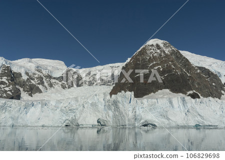 Glaciers and mountains in Paradise bay,  peninsula, Antartica.. 106829698
