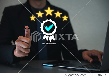 Assurance of top service in business, with ISO certification and compliance with regulations. Businessman giving thumbs up to show approval of service quality and customer satisfaction. Improvement Assurance of top service in business, with ISO certification and compliance with regulations. Businessman giving thumbs up to show approval of service quality and customer satisfaction. Improvement 106830264