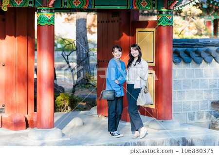 Women enjoying autumn sightseeing Women's trip 106830375