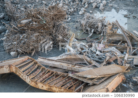 Stairs and scrap metal removed during demolition work 106830990