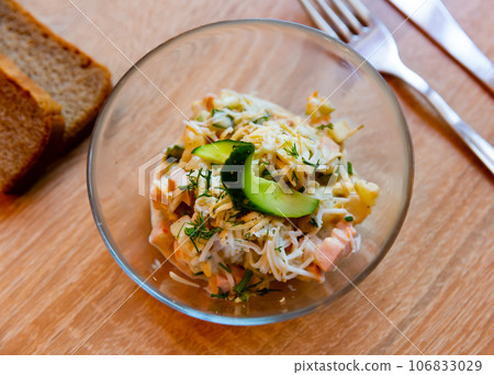 Sausage, cucumber, cheese, mayonaise salad Sausage, cucumber, cheese, mayonaise salad 106833029
