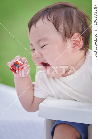 crying baby child infant sad 106833387