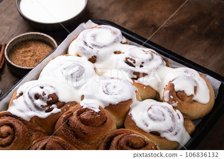 Traditional sweet cinnamon rolls or cinnabon Traditional sweet cinnamon rolls or cinnabon 106836132