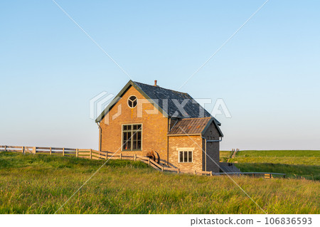 The hous of the mill het noorden is a mill on the island of Texel 106836593