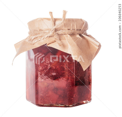 Close-up of glass jar full of delicious lingonberry pear jam with lid wrapped in beige craft paper on white background. Close-up of glass jar full of delicious lingonberry pear jam with lid wrapped in beige craft paper on white background. 106840253