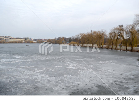 Frozen winter lake Frozen winter lake 106842555