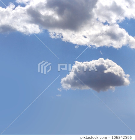 White clouds isolated over blue sky background White clouds isolated over blue sky background 106842596