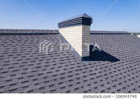 Shingles texture - close up view of asphalt roofing shingles Shingles texture - close up view of asphalt roofing shingles 106843740