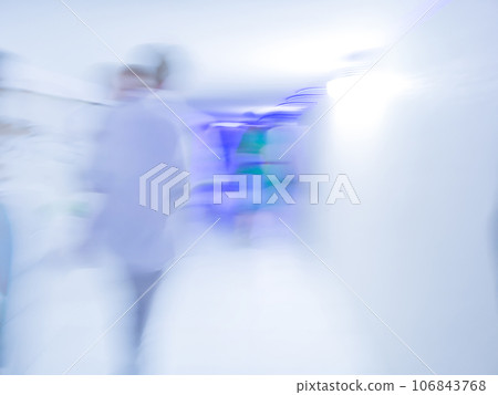 Fluidity of the crowds blur bokeh and space for text background 106843768