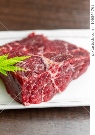 raw fin whale meat 106844762