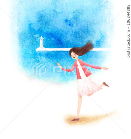a woman on a beach with a lighthouse 106844898