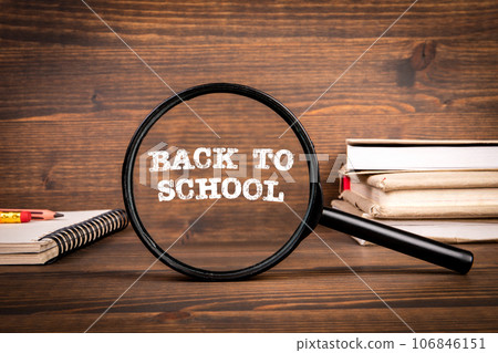 Back To School Concept. Textbooks on a wooden texture table 106846151