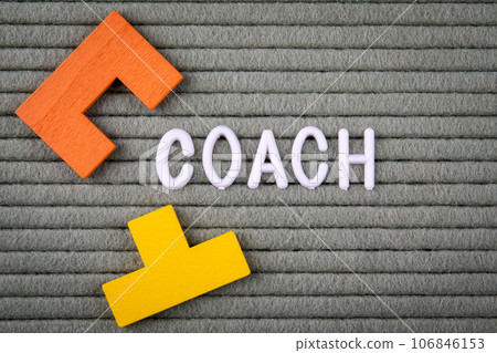 COACH Concept. White letters of the alphabet on a green background COACH Concept. White letters of the alphabet on a green background 106846153