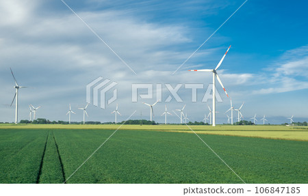 Windmill park, landscape on a sunny day, in North Sea, Germany 106847185